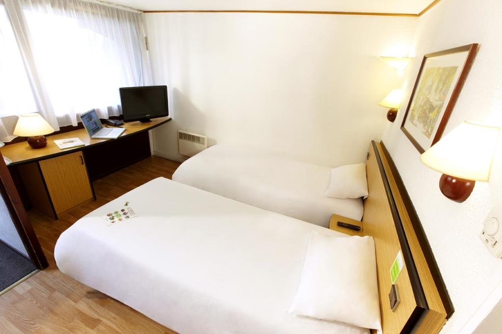 ก็องปานีล มานอสค์ Hotel มาโนสก์ ห้อง รูปภาพ