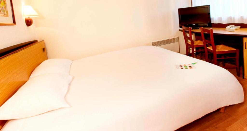 ก็องปานีล มานอสค์ Hotel มาโนสก์ ห้อง รูปภาพ